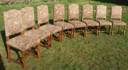 a set of 8 french osso bucco dining chairs
