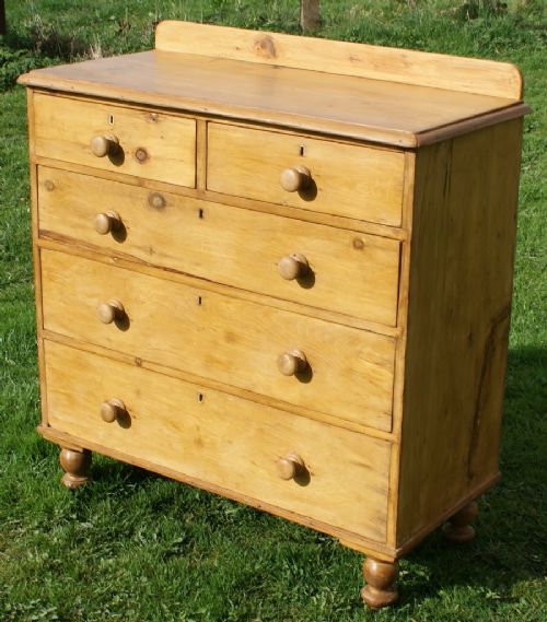 a good victorian 5 drawer stripped pine chest