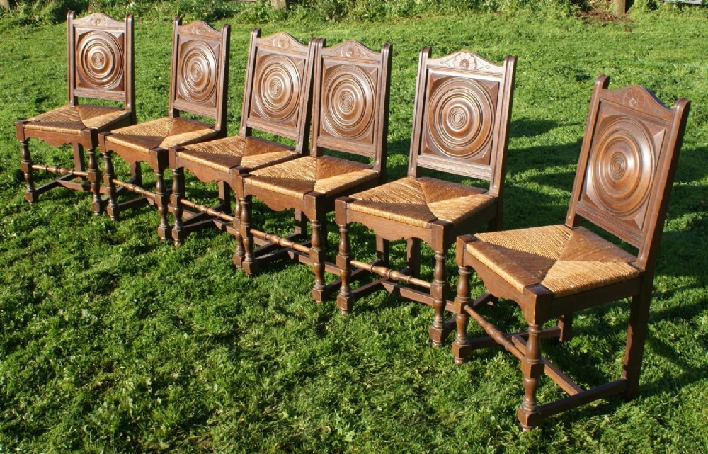 a set of 6 french oak breton dining chairs