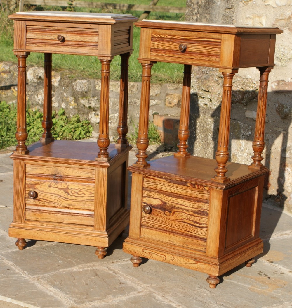 a fine matched pair of french pine henri ii revival bedside cabinets