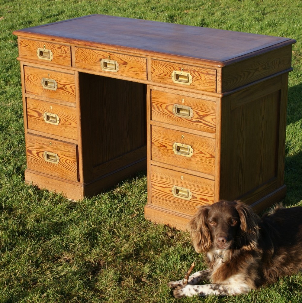 a late 19th century pine pedestal desk