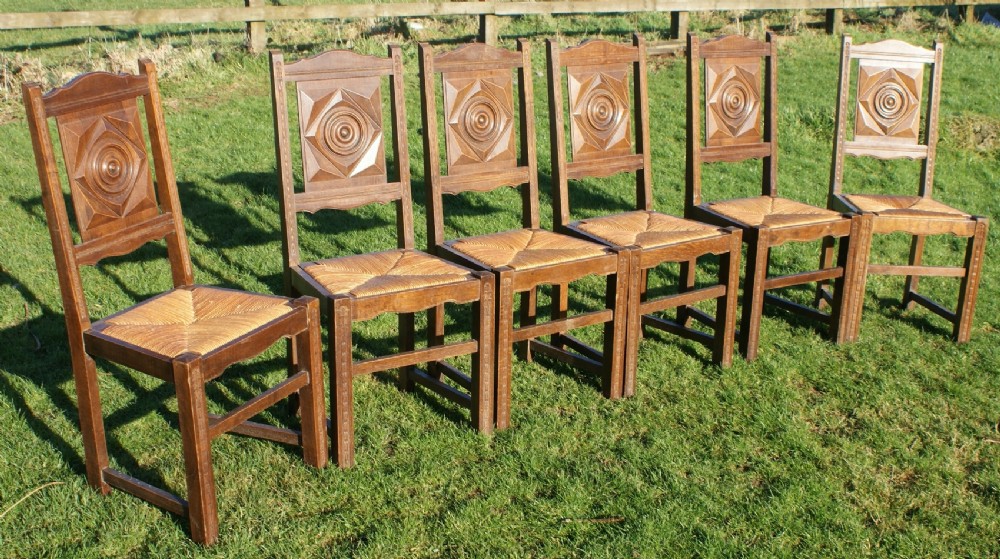 a super set of french breton oak chairs