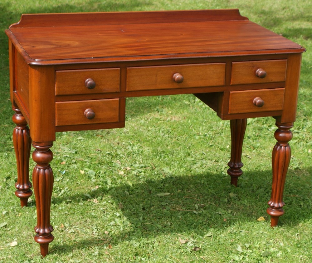 a very pretty little english victorian mahogany ladies writing desk