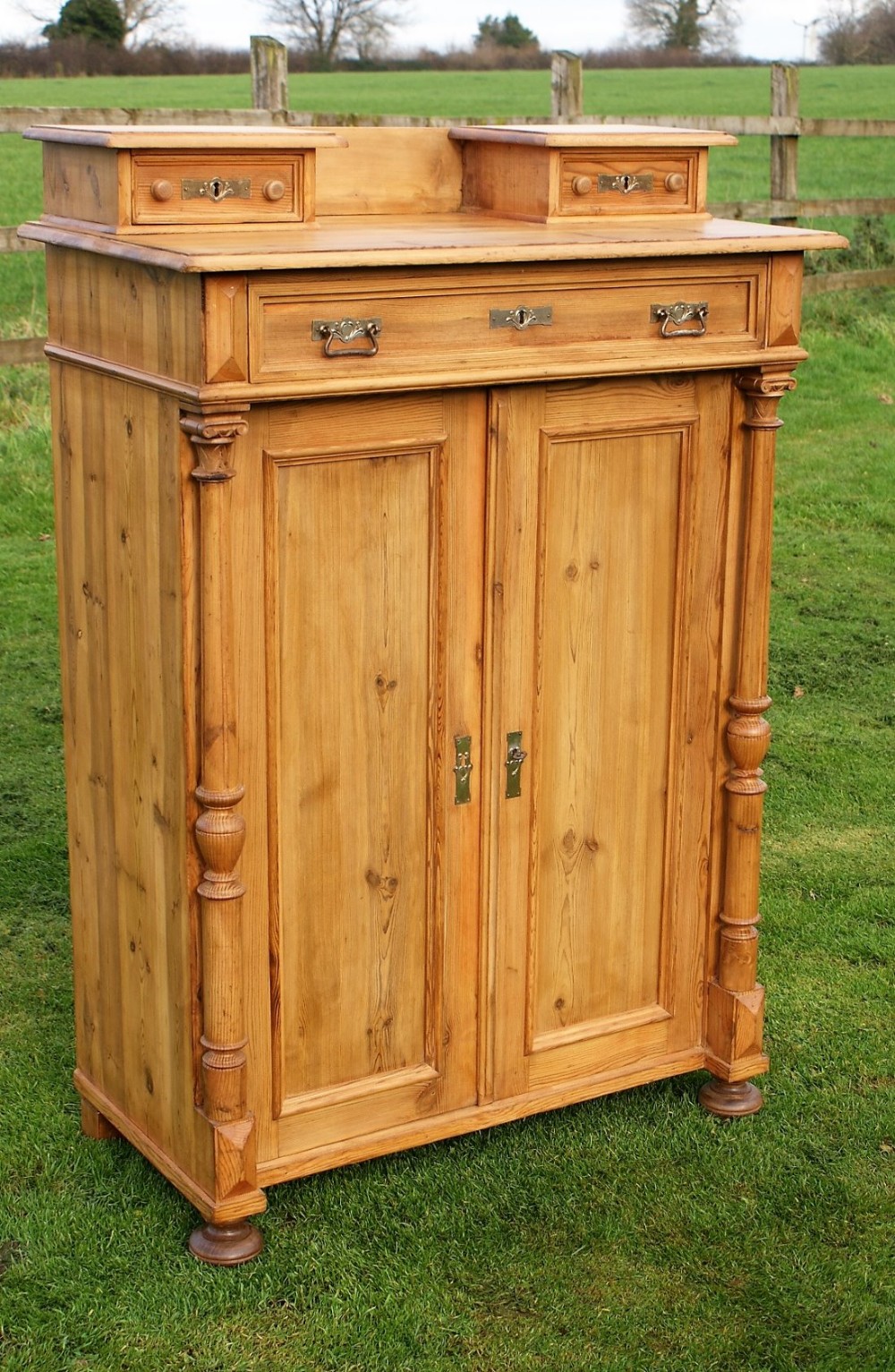 a beautiful early 20th century east german pine bonnet cupboard