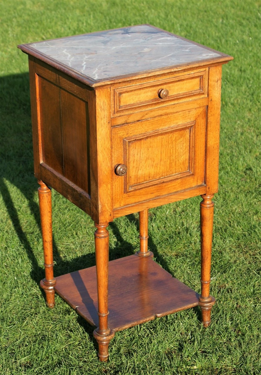 a fine late 19th century french oak bedside cabinet