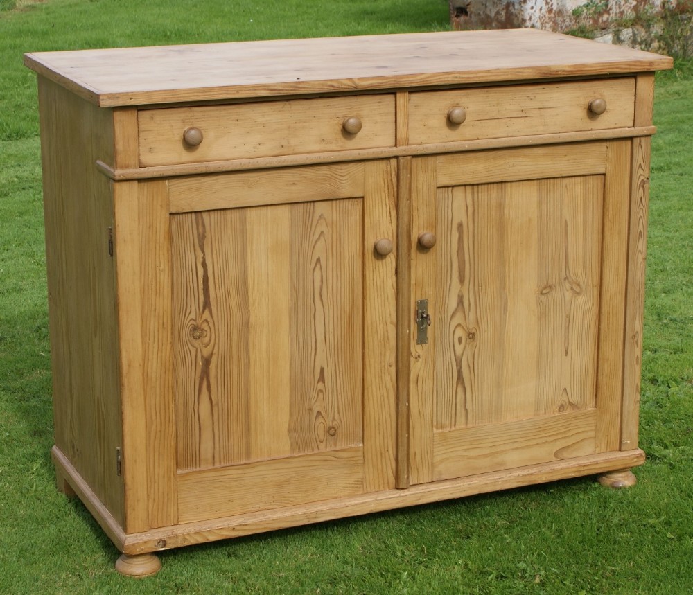 a large east german stripped pine dresser base sideboard