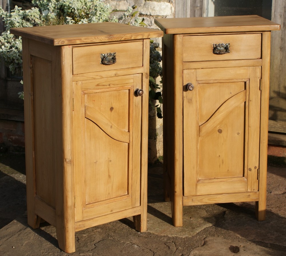 a fine matching pair of antique solid pine dutch bedside cabinets